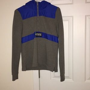 Pink Quarter Zip Pullover with a hood.